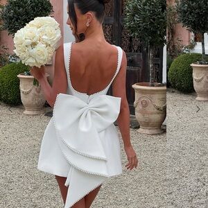 BRAND NEW Baby Boo White Mini Dress